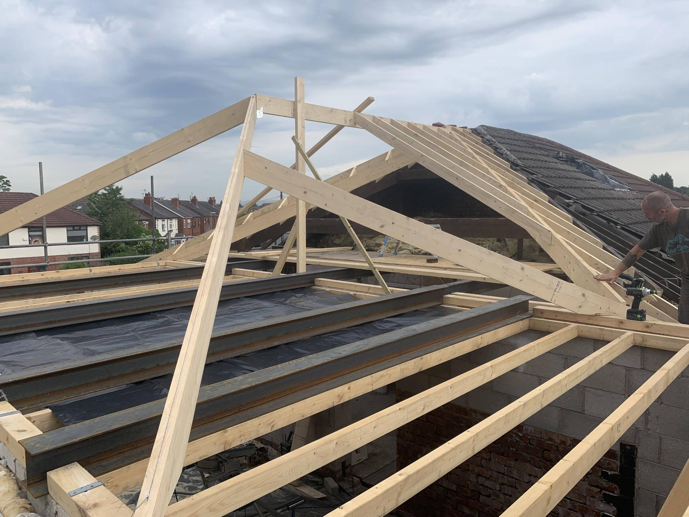 Joiner levelling and pitching the roof